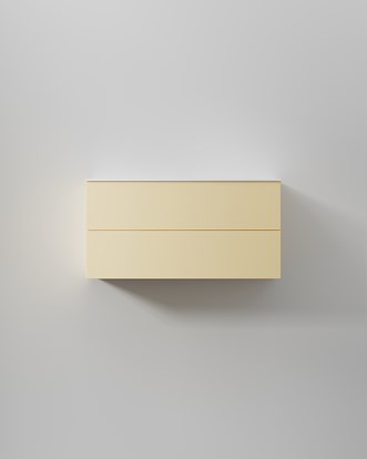 Servantskap i lys smørgul nyanse, en NCS-farge – en av de trendy baderomsfargene i 2026.